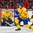 BUFFALO, NEW YORK - JANUARY 5: Sweden's Filip Gustavsson #30 makes a stick save against Canada as Jacob Moverare #27 looks on during the gold medal game of the 2018 IIHF World Junior Championship. (Photo by Andrea Cardin/HHOF-IIHF Images)

